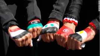 111028082757-arab-spring-hands-story-top