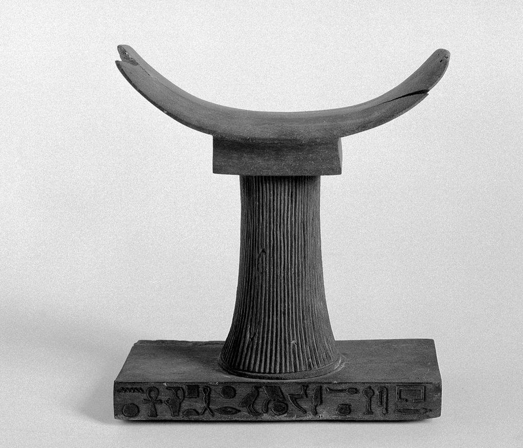L0006750 Egyptian wooden pillow with inscription on base