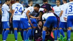 Меси е влязъл в разправия с играчите на Малага при една от многото спорни ситуации в мача