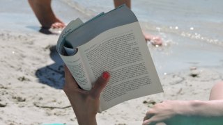reading book at the beach 01