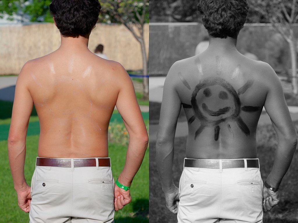 1280px-Sunscreen_on_back_under_normal_and_UV_light