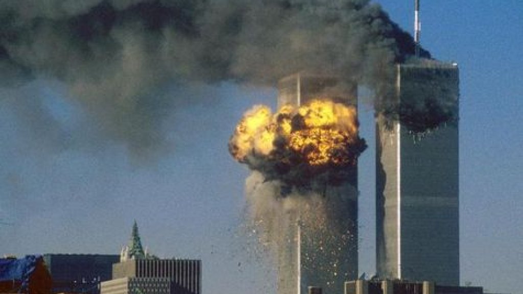 555137-world-trade-center-south-tower-is-impacted-by-hijacked-united-airlinesflight-175