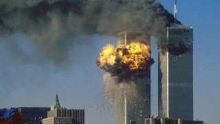 555137-world-trade-center-south-tower-is-impacted-by-hijacked-united-airlinesflight-175