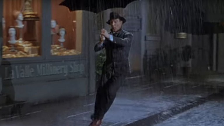 8. Gene Kelley - Singin' in the rain

Един мъж, един чадър, една песен. Подгизналият, но щастлив герой на Джийн Кели в мюзикъла "Аз пея под дъжда" е олицетворение на това как песен и филм могат да бъдат възприемани като едно. В случая песента е написана десетилетия преди премиерата на мюзикъла през 1952-а, но в крайна сметка става популярна в световен мащаб именно благодарение на него и образа на пляскащия доволно в гьоловете Кели.