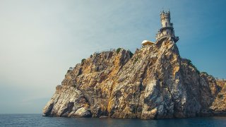 Castle on the cliff by the sea. Swallow's Nest Castle Ukraine Crimea mountain