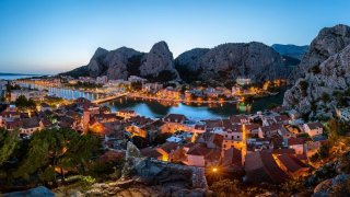 Aerial Panorama of Omis and Cetina River Gorge in the Evening, D