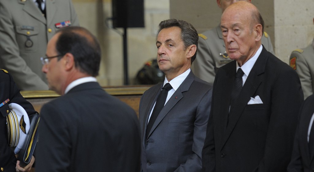 France's President Hollande arrives to attend a religious ceremony inside the Invalides church in Paris