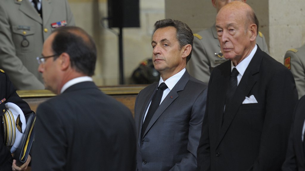 France's President Hollande arrives to attend a religious ceremony inside the Invalides church in Paris