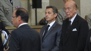 France's President Hollande arrives to attend a religious ceremony inside the Invalides church in Paris