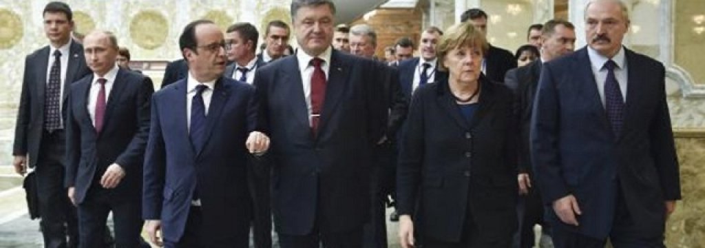 Belarus' President Lukashenko, Russia's President Putin, Ukraine's President Poroshenko, Germany's Chancellor Merkel and France's President Hollande walk during peace talks in Minsk