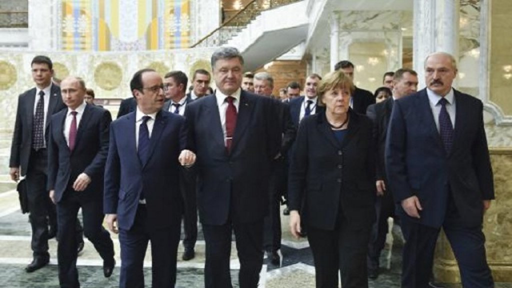 Belarus' President Lukashenko, Russia's President Putin, Ukraine's President Poroshenko, Germany's Chancellor Merkel and France's President Hollande walk during peace talks in Minsk