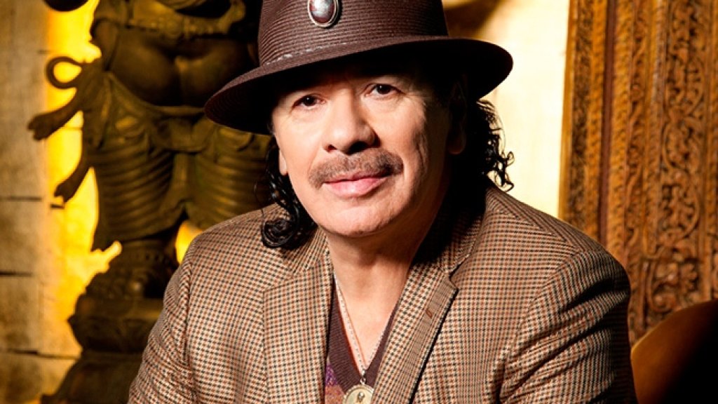 carlos-santana-press-2013-650-430
