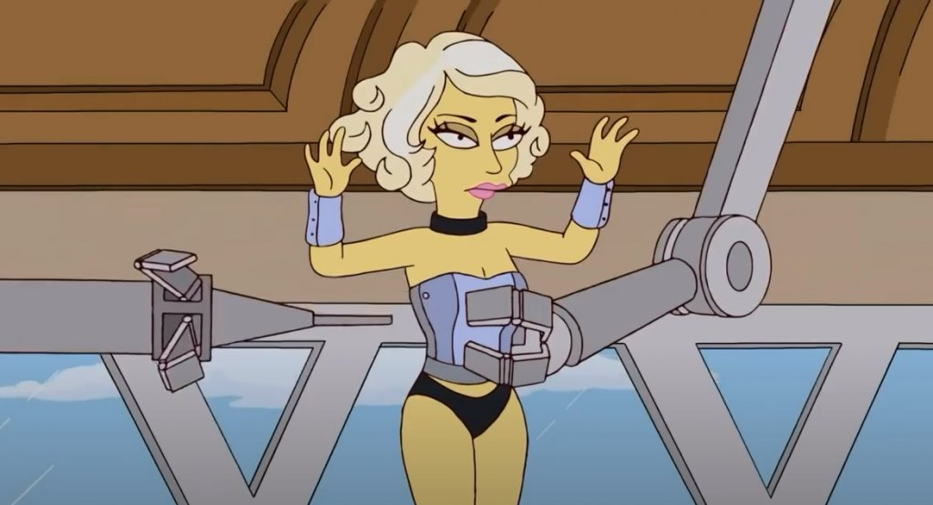 “Семейство Симпсън”
От най-забавните актьорски гостувания на Гага със сигурност е и участието ѝ в “Семейство Симпсън”. В епизода изпълнителката озвучава рисуваната си версия, която е долетяла в Спрингфийлд, за да даде кураж на Лиса Симпсън.
“Винаги съм харесвала сериала, но се изненадах, когато ме поканиха да озвуча героинята си. Беше много забавно, съставът е невероятен и съм много щастлива, че участвах”, каза Гага да включването си в продукцията.