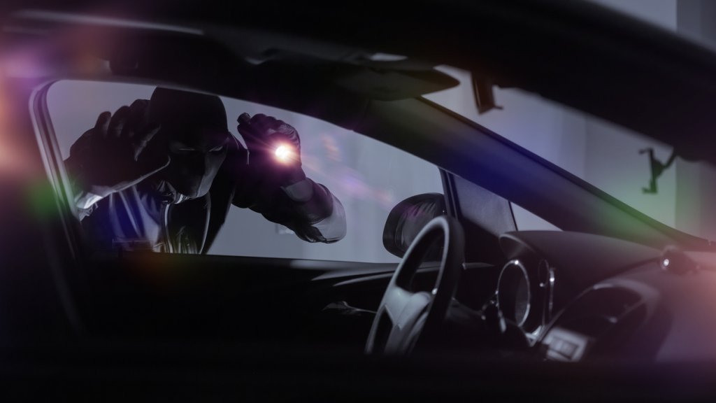 Car Robber with Flashlight
