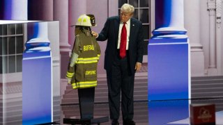 Former_President_Donald_Trump_paying_respect_to_Corey_Comperatore_(53887491621)