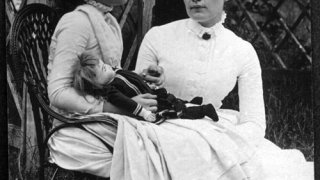 Helen_Keller_with_Anne_Sullivan_in_July_1888