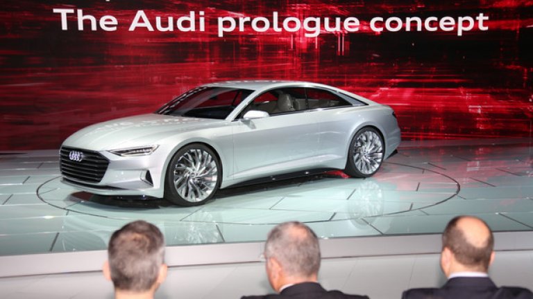 Audi Prologue
Концептуалният Prologue е първият проект, създаден под ръководството на новия главен дизайнер на Audi Марк Лихте, който заема поста от февруари. Размерите на Prologue са сходни с тези на стандартната лимузина А8, а вече вървят слухове, че концептът ще се превърне в серийния А9.
Лихте обясни, че при създаването на Prologue дизайнерите се черпили вдъхновение от някои от най-известните модели на марката, сред които 90 quattro IMSA GTO, оригиналното ТТ и първото поколение на А8, представено през 1994.