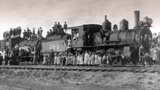orphan-train-crowd-e1732631909379