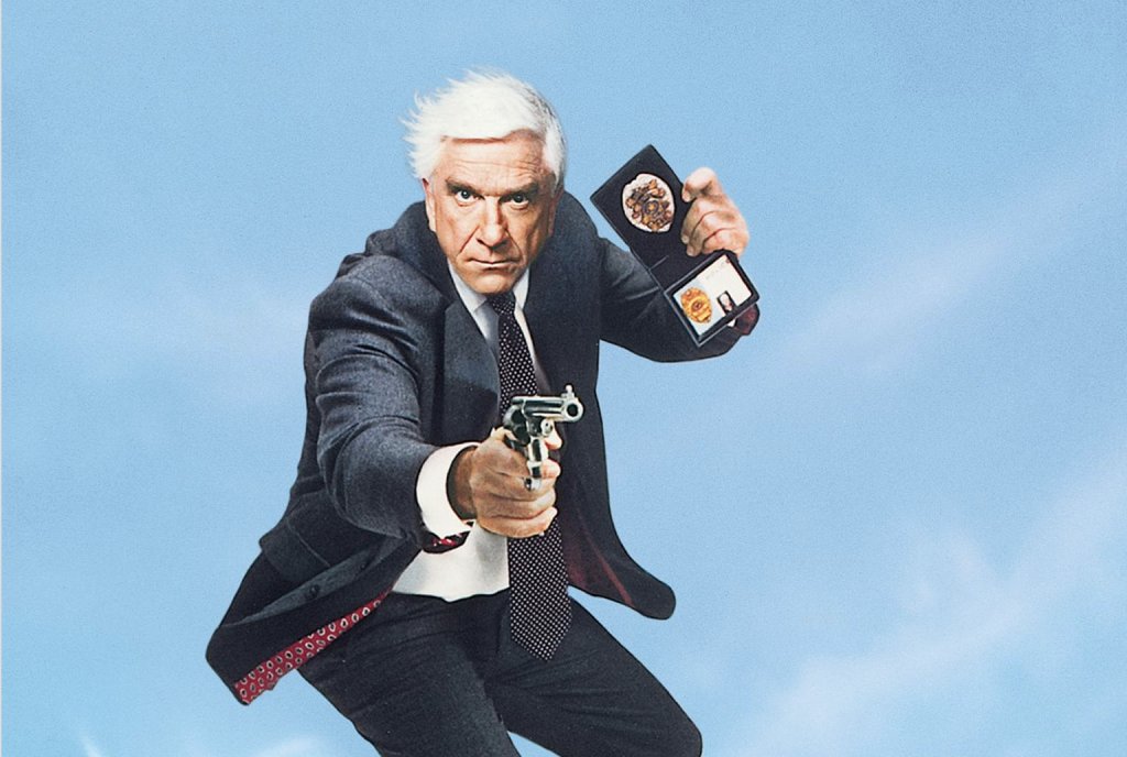The Naked Gun/ "Голо оръжие" 
И все пак ако има един агент на закона, в който никога не трябва да се съмняваме, това е лейтенант Дребин. Героят на невероятния Лесли Нилсен и един от най-запомнящите му се пародийни филми - "Голо оръжие", са перфектно решение за мрачното настроение. Освен "Голо оръжие" тук можете да заложите на "Робин Худ: Мъже в чорапогащи", "Животът на Браян" или "Светия Граал" на Монти Пайтън, както и редица други нелепи комедии.