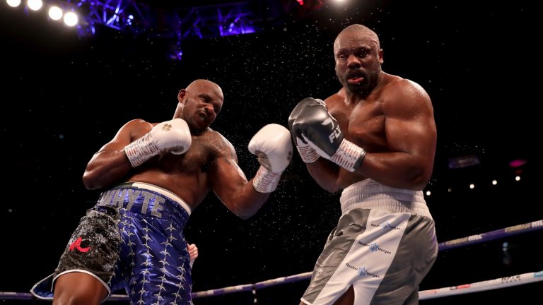 Безмилостно ляво кроше сложи край на епичната битка в 11-ия рунд, когато Уайт изглеждаше по-свежия боксьор