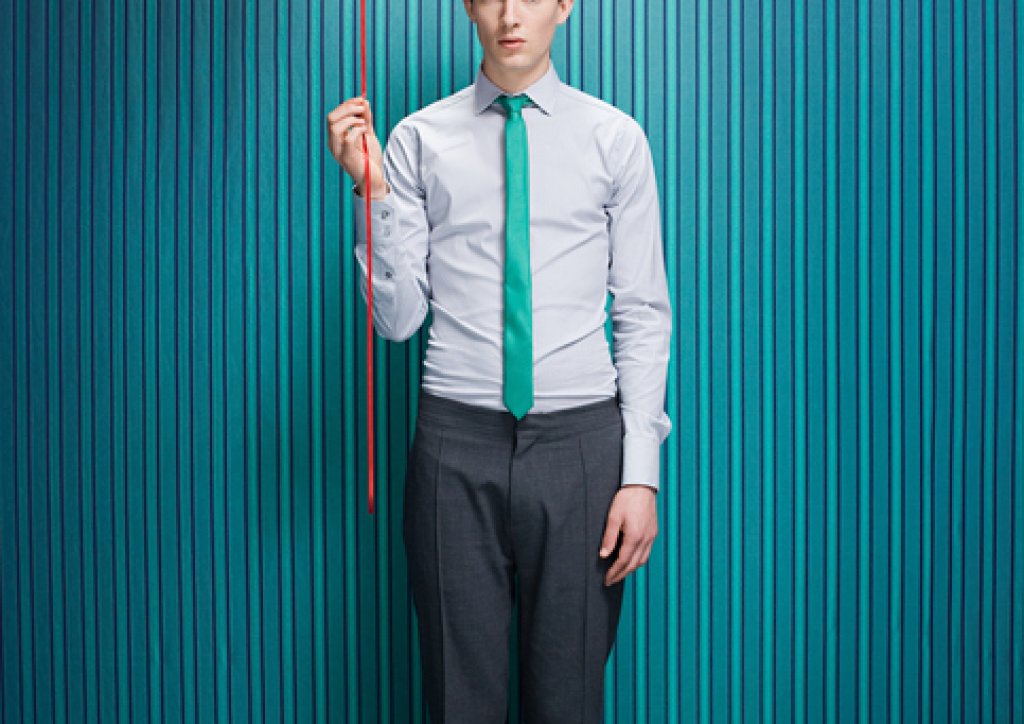 Young man with heart shaped balloon