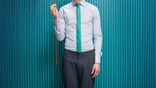 Young man with heart shaped balloon