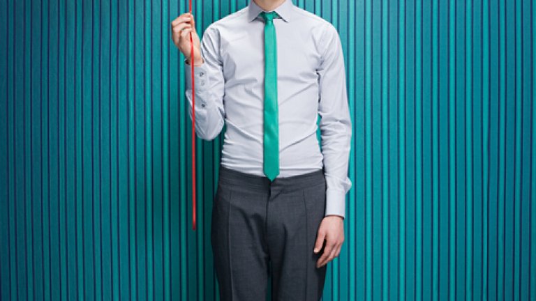 Young man with heart shaped balloon