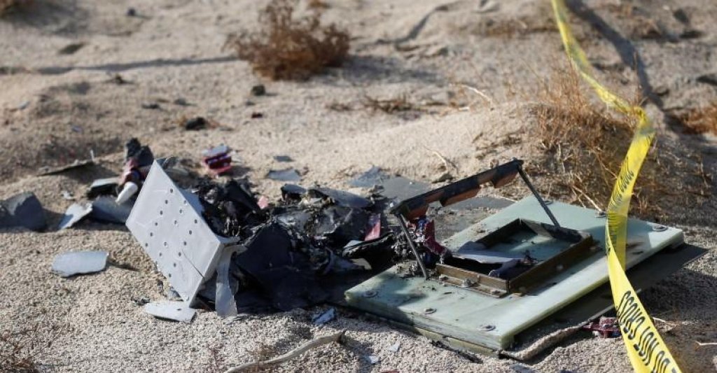 Piece of debris is seen near the crash site of Virgin Galactic's SpaceShipTwo near Cantil