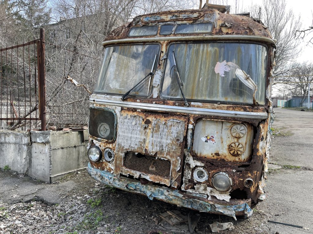 burnt abandoned bus