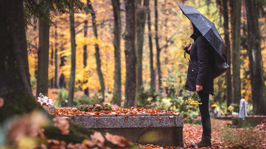 Silent grief in graveyard