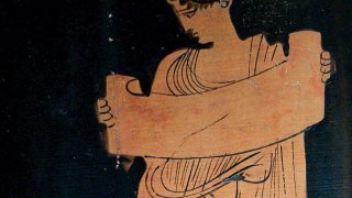 Muse_reading_Louvre_CA2220_(cropped)