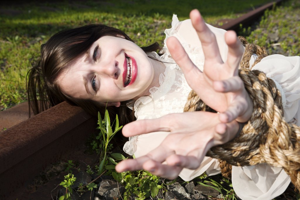 Desperate woman tied to railroad pleads for help