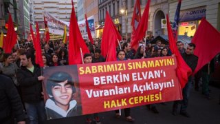 People protesting about the death of teenager Berkin Elvan at his funeral ceremony in Istanbul