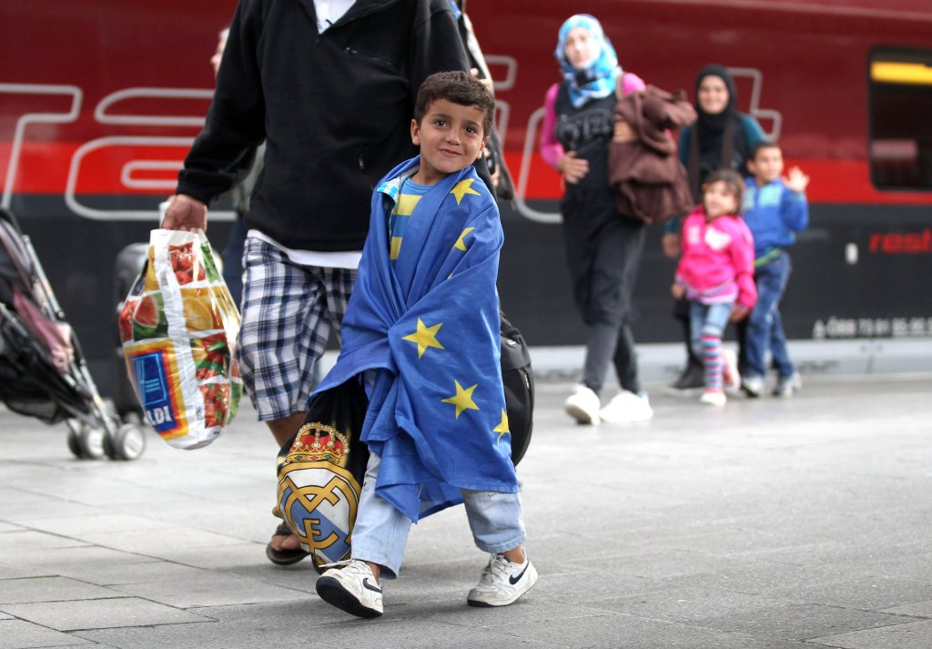 Migrants Arrive In Germany Following Ordeal In Hungary