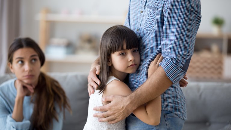 Unhappy little child hug leaving parent say goodbye