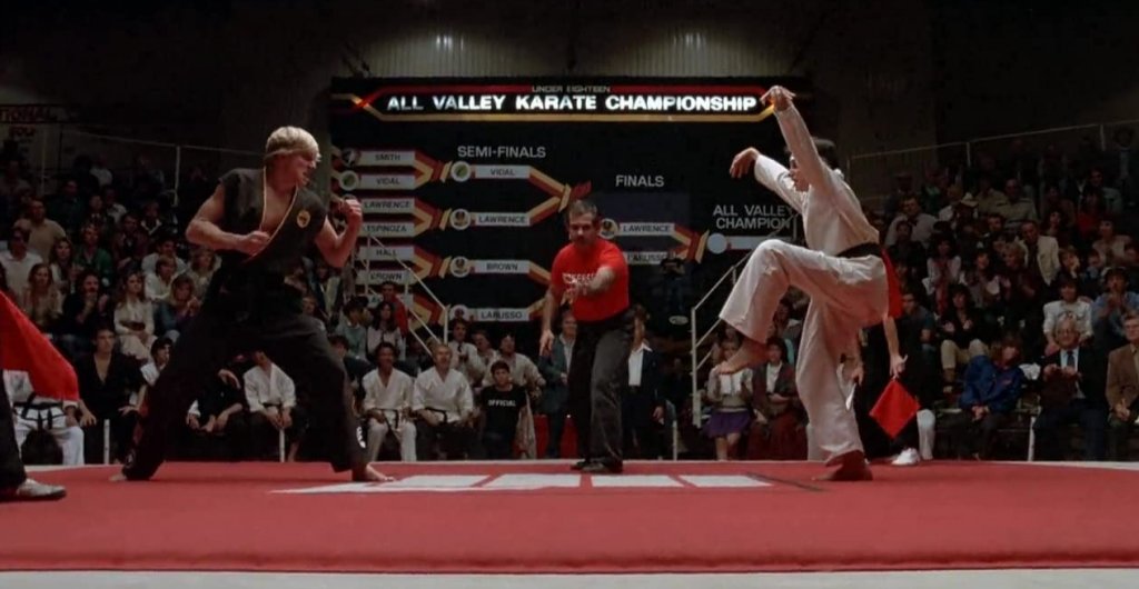Karate Kid

Няма как да се води разговор за филми за бойни изкуства без да се спомене и "Карате кид". Той стана толкова култов, че препратки към него продължават да се правят в много днешни филми и сериали, а за милиони хора по света думите "Кобра Кай" все още са синоним на злото и несправедливостта. Нещо, което едноименният сериал сега се опитва да поправи.
