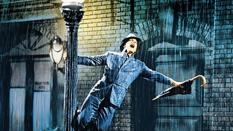 Gene Kelly - Singing In The Rain 
Но не само слънцето може те зареди с енергия. Понякога това го може и дъждът. Особено, когато подобно на Джийн Кели танцуваш и пееш под дъжда. Песента от "Аз пея под дъжда" още от самото си излизане печели популярност именно със своя позитивизъм и с емоцията, която предава на слушащите.