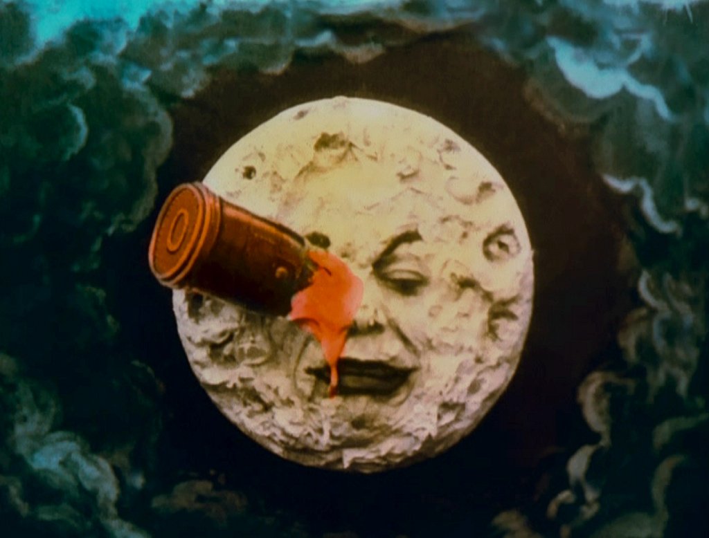 le-voyage-moon-face-rocket-in-eye