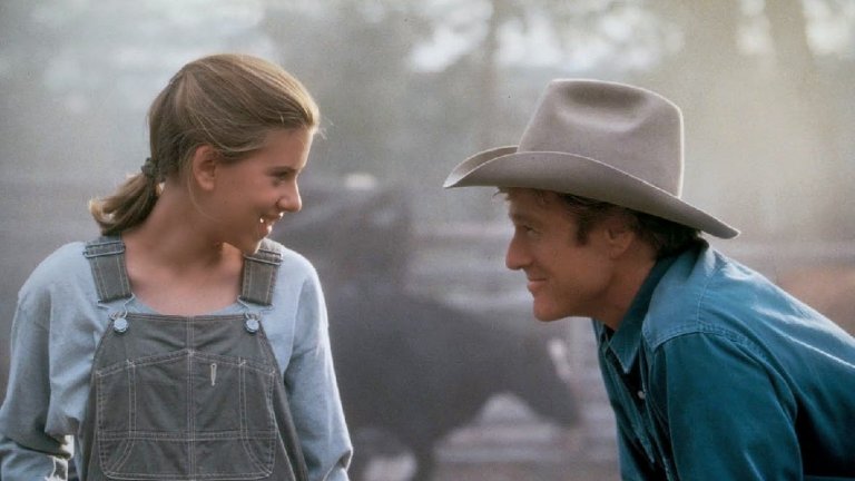 "Повелителят на конете" / The Horse Whisperer (1998) 
Редфорд влиза в ролята на Том Букър, талантлив треньор по езда, който притежава необичайно силна способност да разбира конете. Грейс (Скарлет Йохансон) е младо момиче, което претърпява тежка травма при инцидент с коне. Отчаяна от състоянието на дъщеря си, майката (Кристин Скот-Томас) моли Букър да помогне на момичето във възстановяването й. Това е първият филм, в който Редфорд участва едновременно като режисьор и актьор.