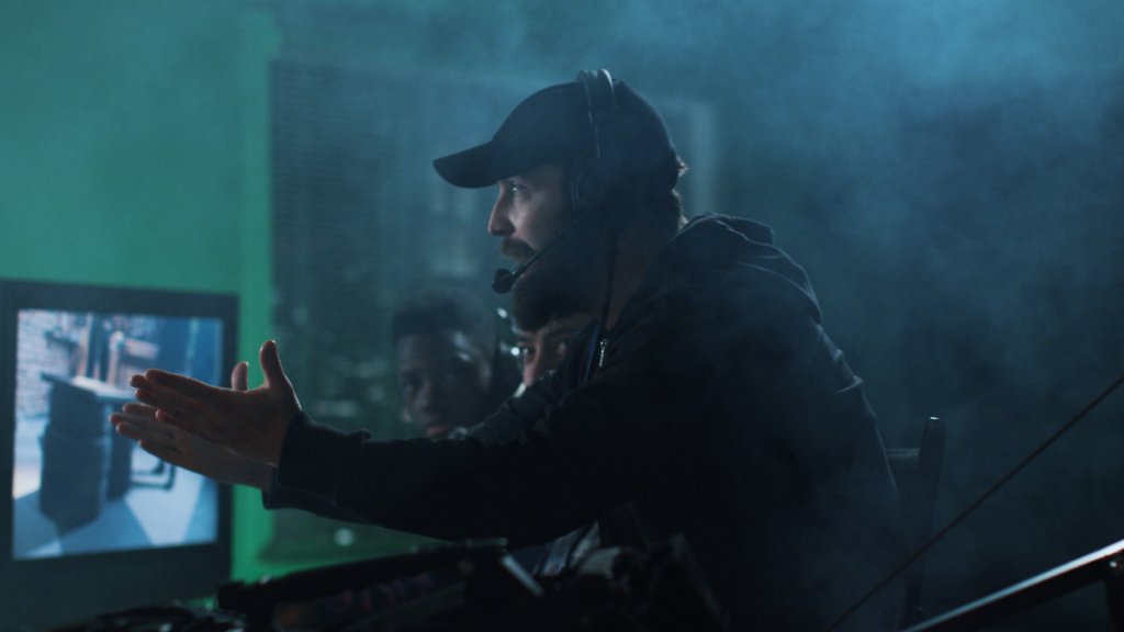 Movie director scolding team on shooting set