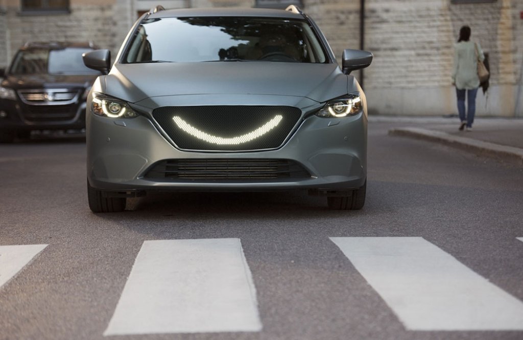 07-When-the-self-driving-car’s-sensors-detect-a-pedestrian-a-smile-lights-up-at-the-front-of-the-car-and-the-car-stops