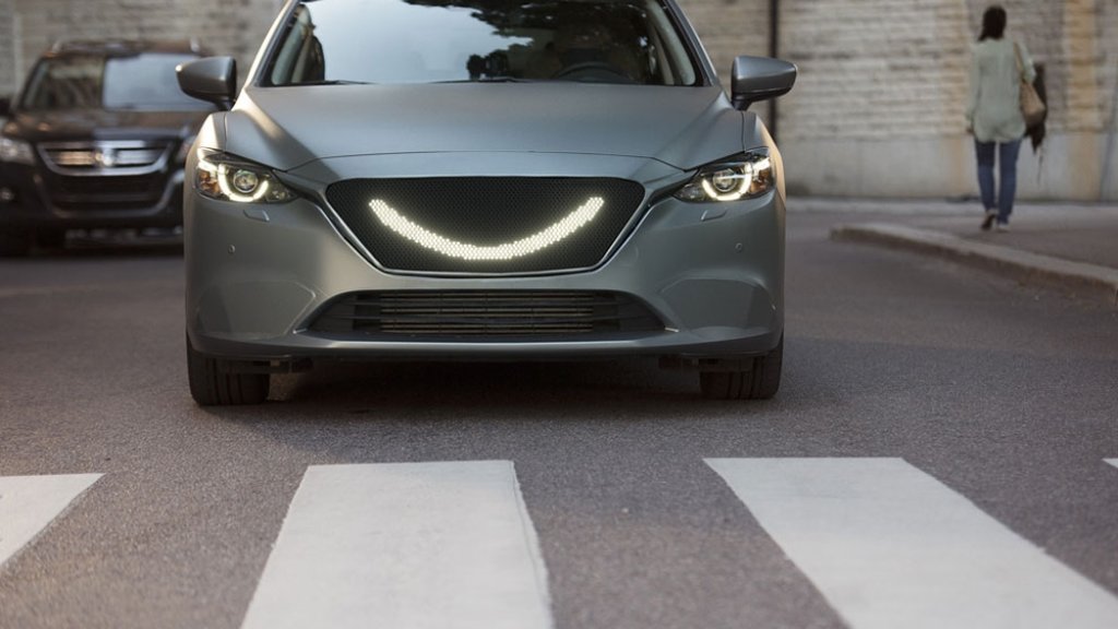07-When-the-self-driving-car’s-sensors-detect-a-pedestrian-a-smile-lights-up-at-the-front-of-the-car-and-the-car-stops