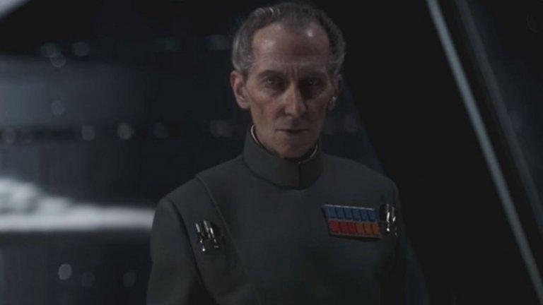 Питър Къшинг, Rogue One: A Star Wars Story (2016)
Питър Къшинг играе ролята на злия Гранд Моф Таркин в "Междузвездни войни - Епизод 4: Нова надежда" (1977 г.).  "Rogue One: История от Междузвездни войни" (2016 г.) всъщност разказва предисторията на онзи филм и една поява на Таркин е напълно в реда на нещата. Актьорът обаче напуска този свят още през 1994 г. За да вкарат Къшинг във филма, специалистите от студиото ILM използват архивни кадри с него, за да възпроизведат лицето му (подобно на случая с Уокър).
Актьорът Гай Хенри, избран заради сходната структура на лицето, изиграва физически Таркин в няколко сцени от "Rogue One", а след това върху неговото лице дигитално е поставено това на Къшинг. Резултатът не е напълно перфектен като разликата личи най-вече в устните на персонажа при произнасяне на репликите. Въпреки това обаче случаят с Къшинг е показателен за това как технологиите вече позволяват един актьор да бъде "използван" във филм десетилетия след смъртта си.