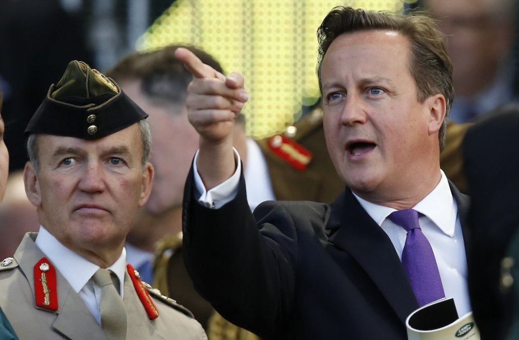 Britain's PM Cameron and Chief of the Defence Staff Houghton attend the opening ceremony of the Invictus Games in London