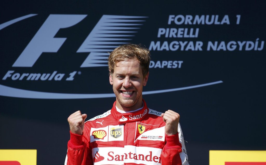 Winner Ferrari Formula One driver Vettel of Germany celebrates after the Hungarian F1 Grand Prix at the Hungaroring circuit, near Budapest