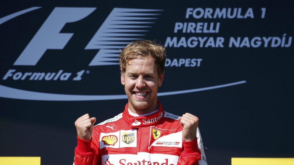 Winner Ferrari Formula One driver Vettel of Germany celebrates after the Hungarian F1 Grand Prix at the Hungaroring circuit, near Budapest