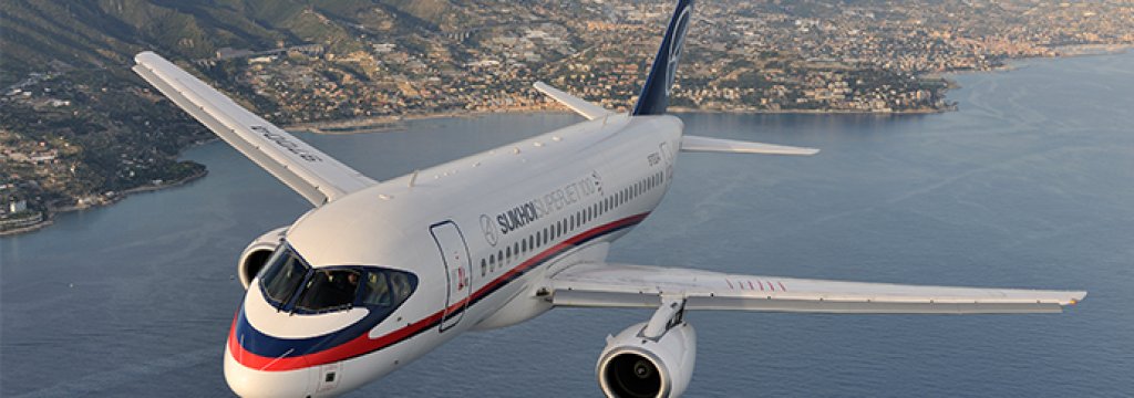 Air-to-air_photo_of_a_Sukhoi_Superjet_100_(RA-97004)_over_Italy