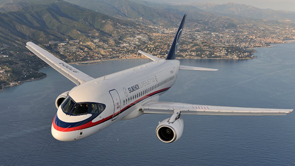 Air-to-air_photo_of_a_Sukhoi_Superjet_100_(RA-97004)_over_Italy