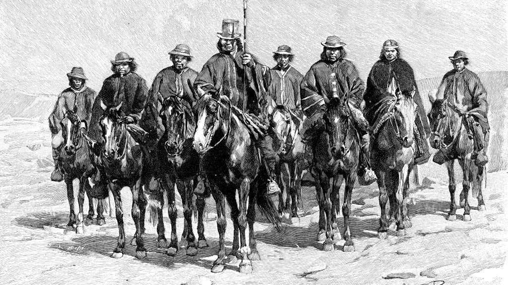 An Araucanian (Mapuche) chief and his staff, Chile/Argentina, 1895.
