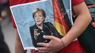 Migrants Arrive In Germany Following Ordeal In Hungary